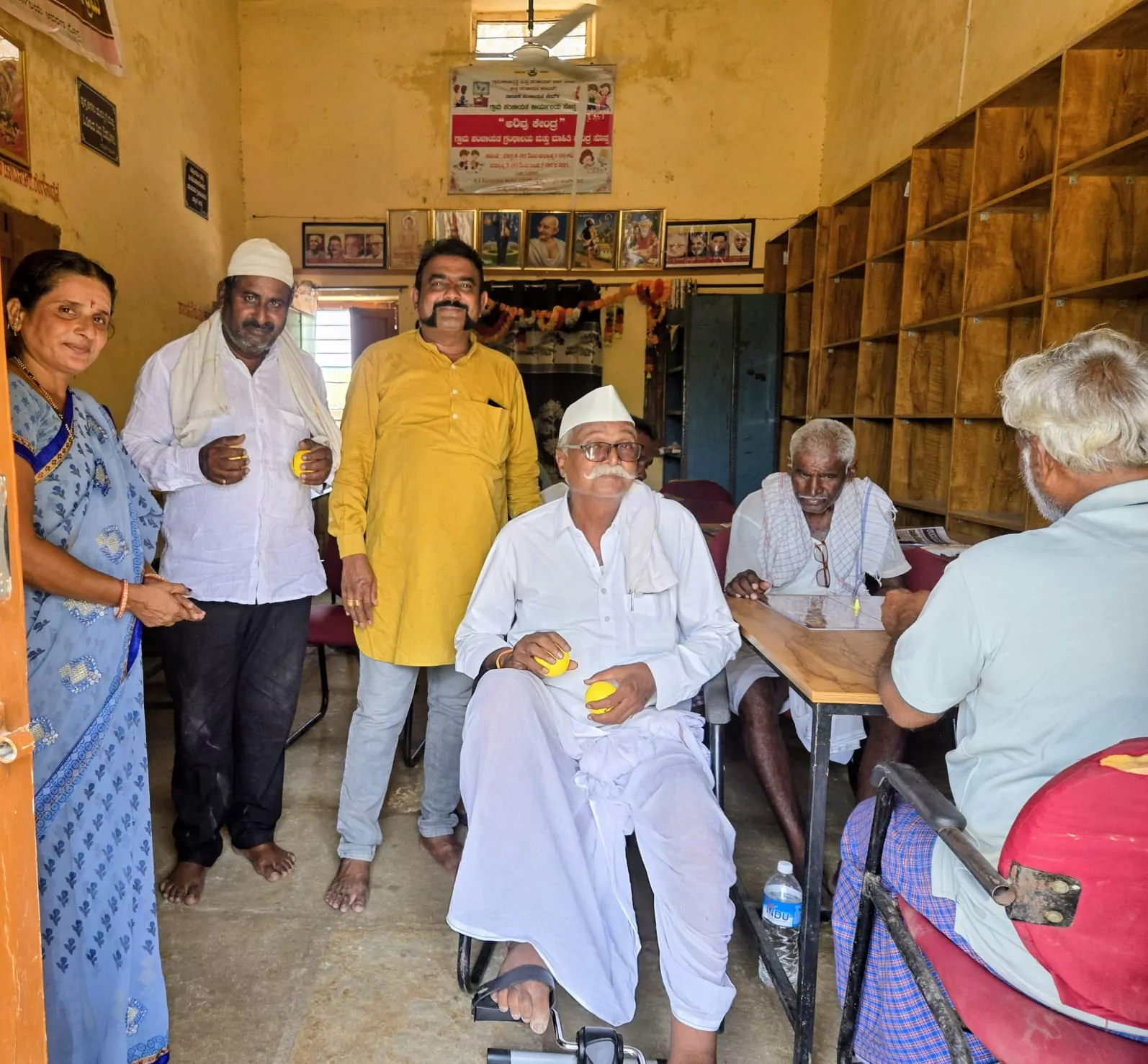 Elders and neighbours gathered together inside the library